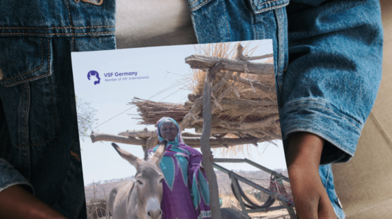 Woman holding the annual report