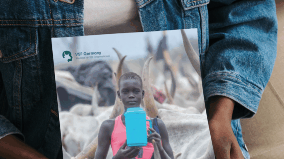 Woman holding the annual report