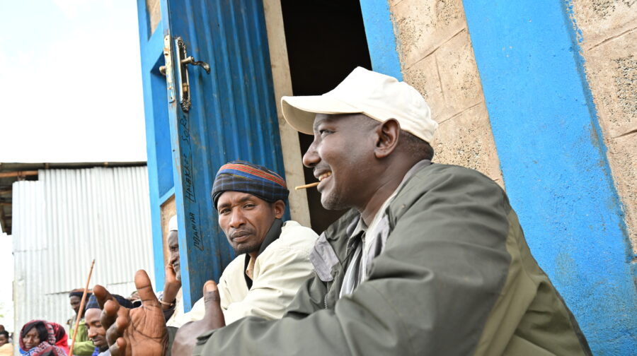 Parishioners sit together and exchange ideas during a project discussion.